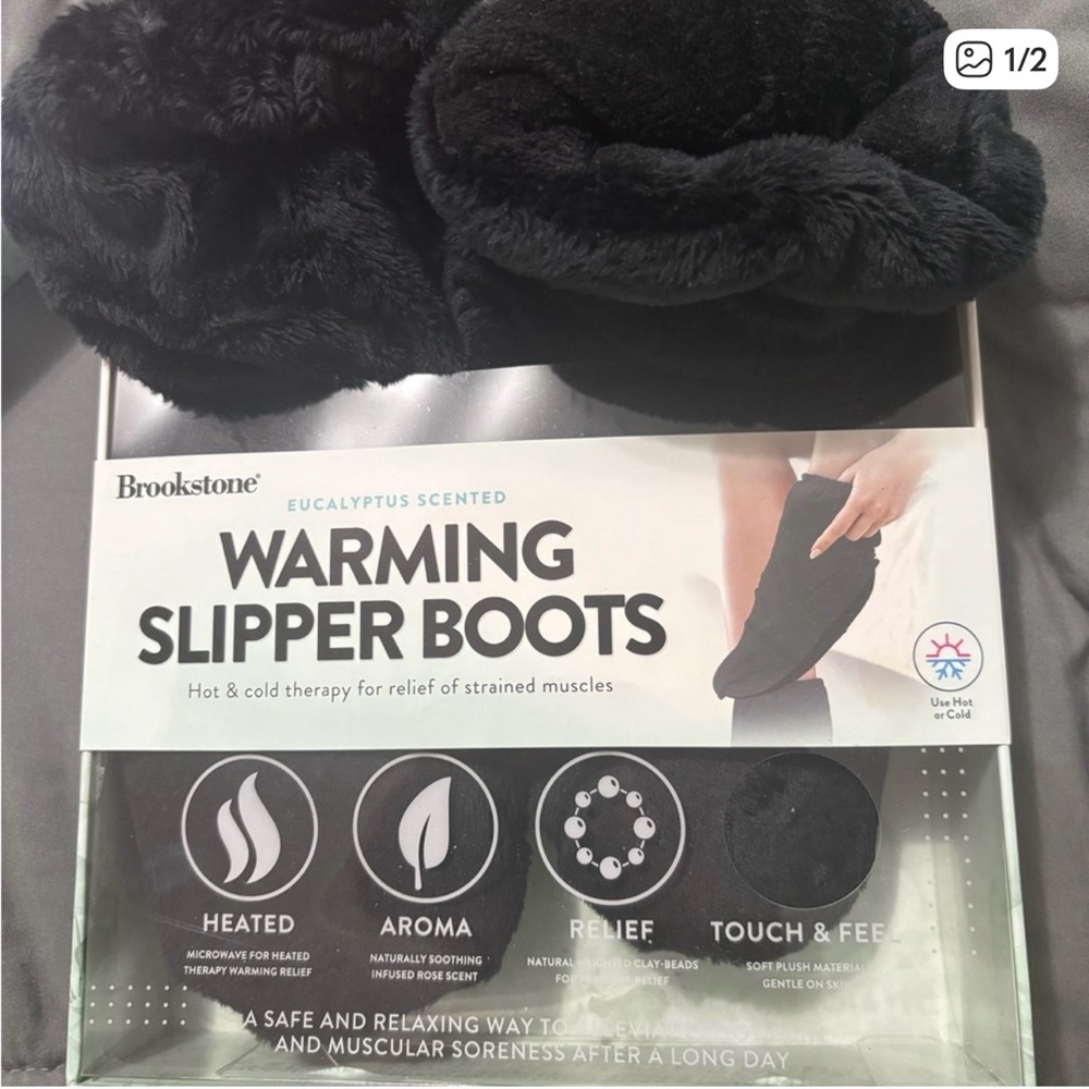 Still in packaging Brookstone Black Warming Slipper Boots